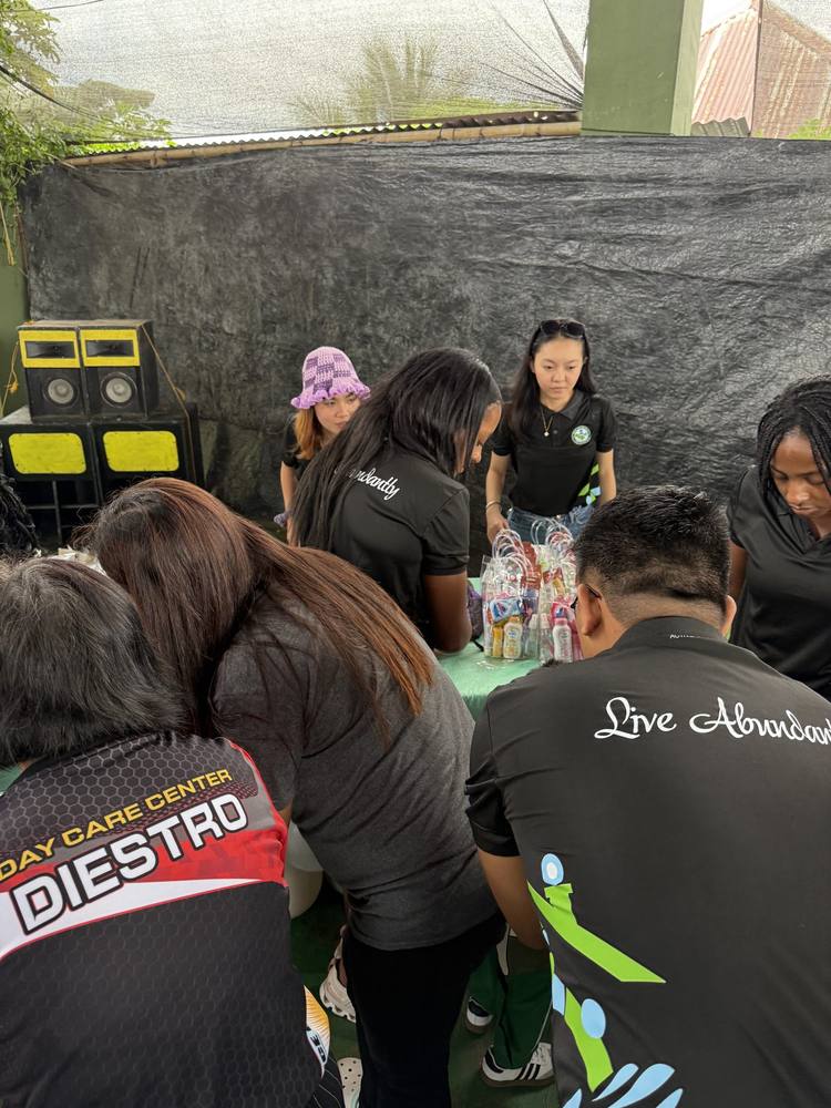The team preparing hygiene kits for the children